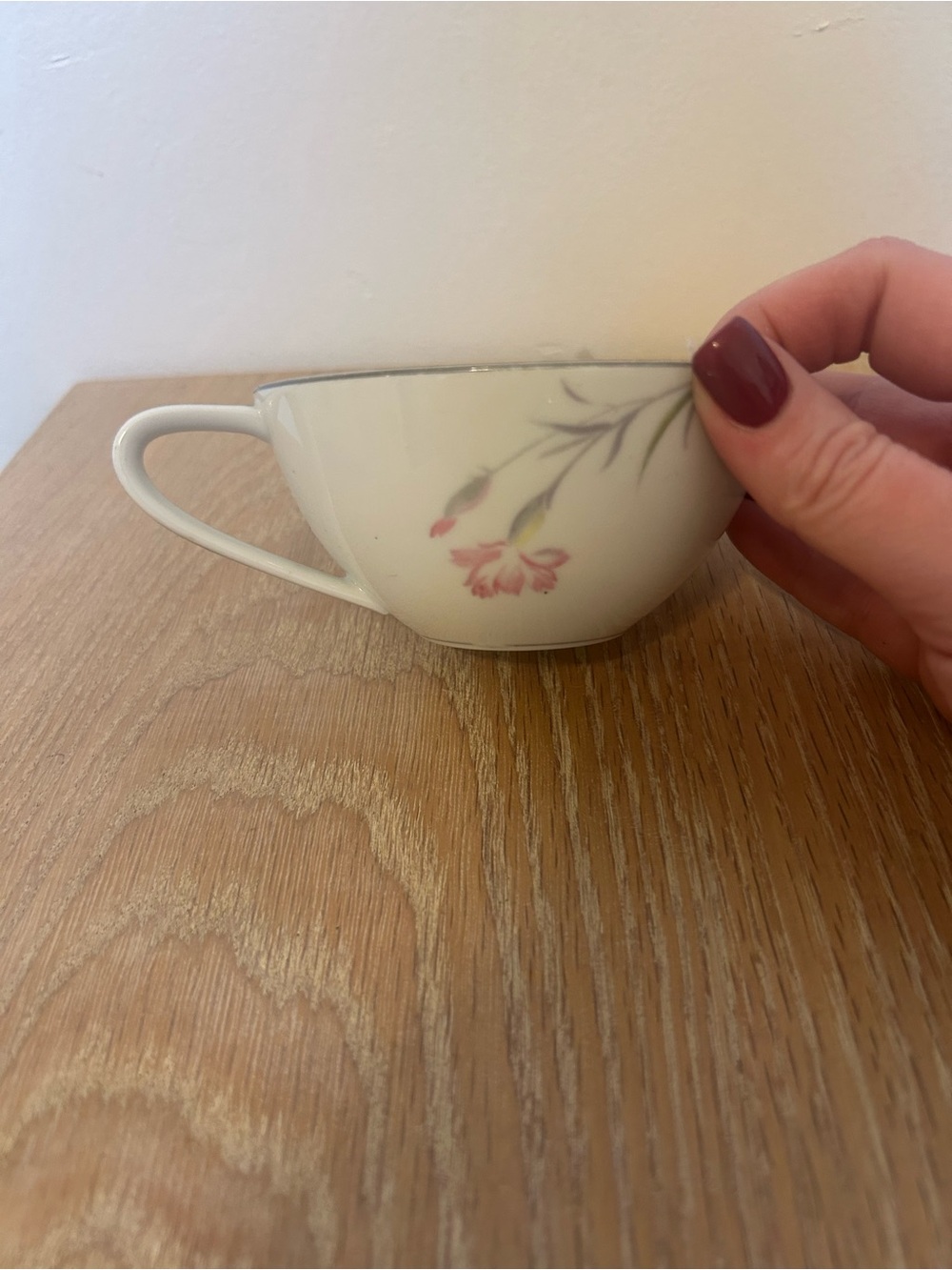 Noritake White Porcelain Teacup with Pink Floral Motif